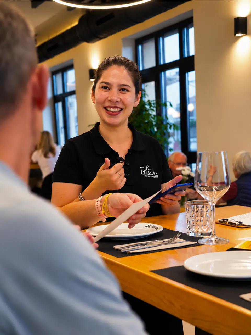 Atención y ambiente en el restaurante La Pilastra